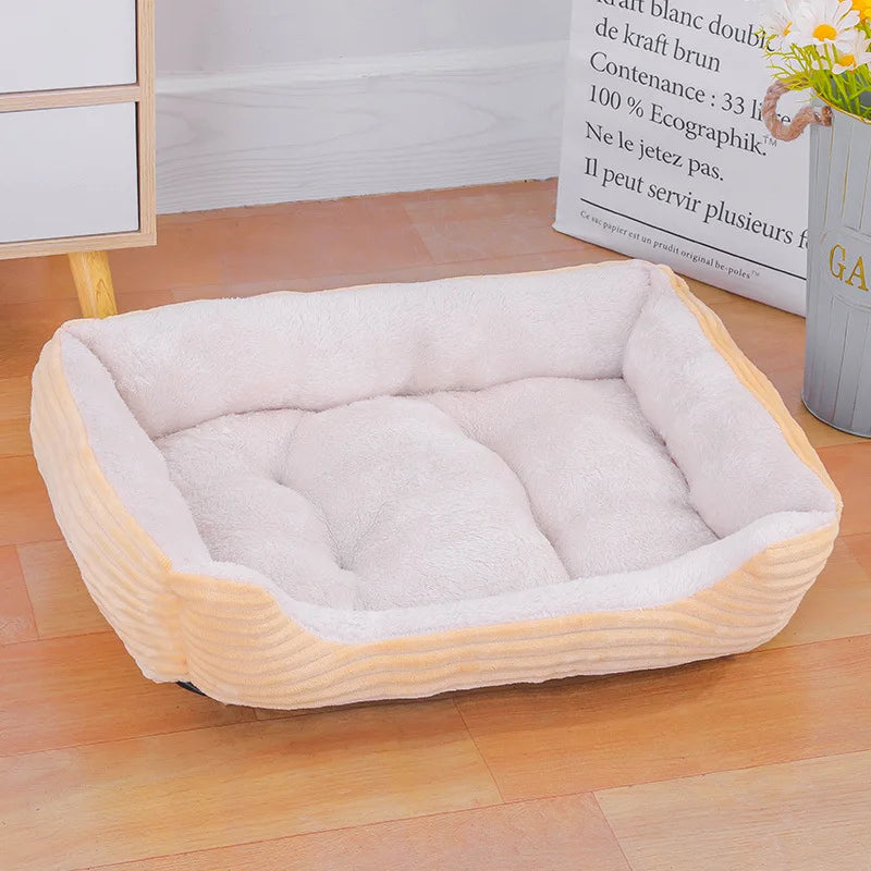 Square tan and brown comfortable pet bed with thick padded bolsters for dogs and cats.