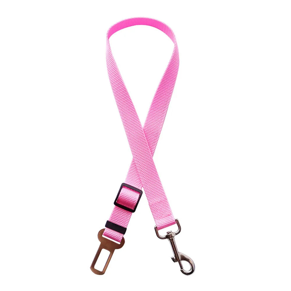 Baby pink elastic dog car seatbelt designed to minimize driving distractions.