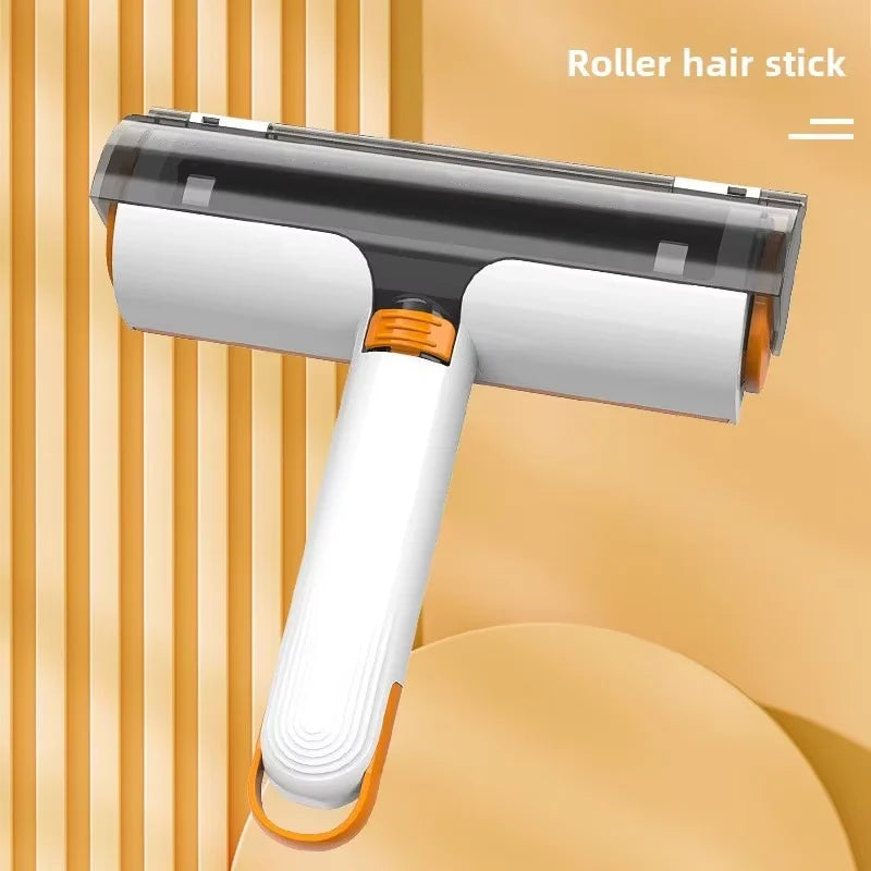 White and orange portable pet hair removal roller with an ergonomic handle for clothes and furniture.