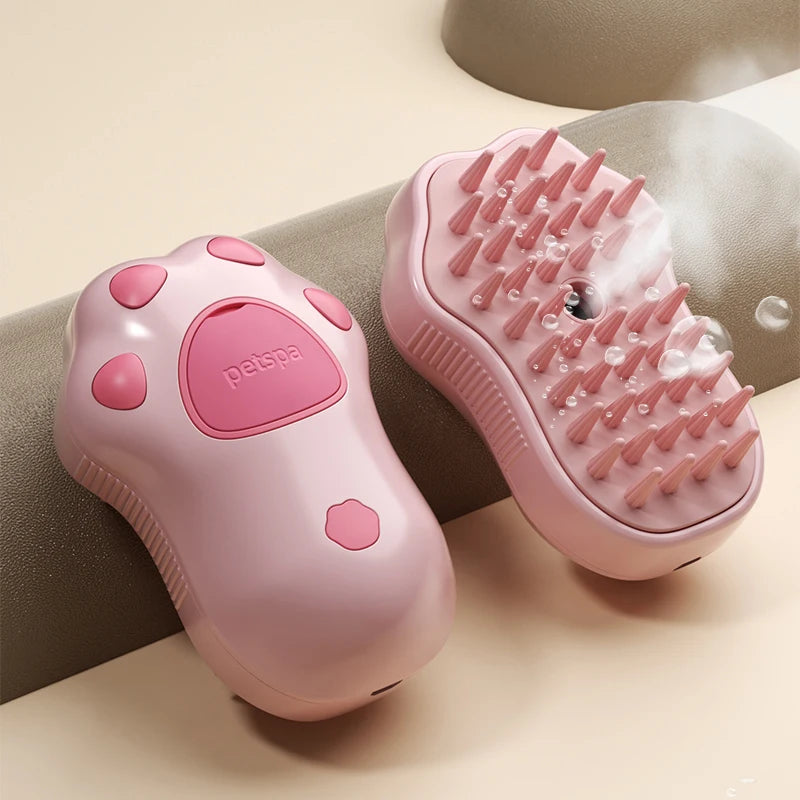 Pink steamy pet grooming brush